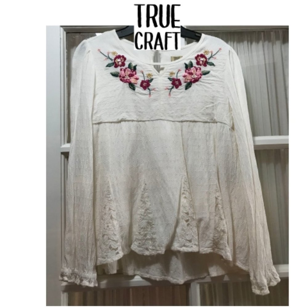 True Craft top with embroidered floral design; girls' size L.